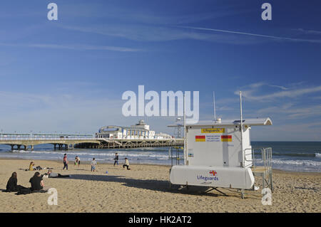 Bournemouth Beach and Pier with Lifeguard Station in Springtime, Bournemouth Dorset England Stock Photo