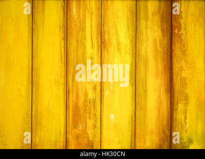 Yellow peeling paint wooden background Stock Photo