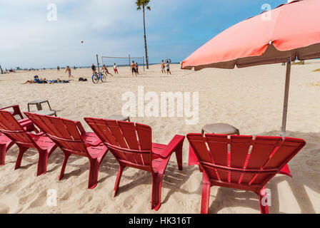 Blue Adirondack Chairs at Beach Stock Photo - Alamy