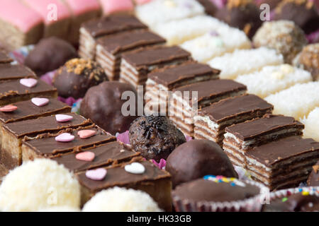 Various homemade sweet cookies decorated on a plate Stock Photo