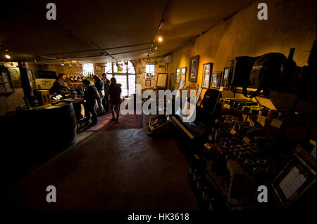 Tourists wine tasting at Muratie Wine Farm, Stellenbosch, South Africa Stock Photo