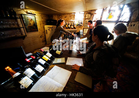 Tourists wine tasting at Muratie Wine Farm, Stellenbosch, South Africa Stock Photo