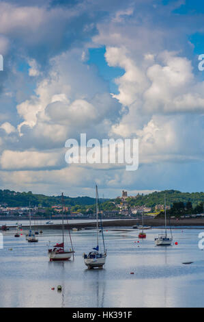 Looking across the Menai straits a half tide, from Beamaris towards Bangor. With yachts and boats in water Stock Photo