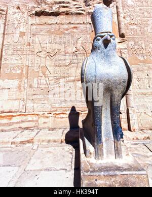 Ancient Egyptian Civilization Statue of God Horus Standing in Courtyard of Temple of Philae between Aswan and Luxor, Egypt Stock Photo