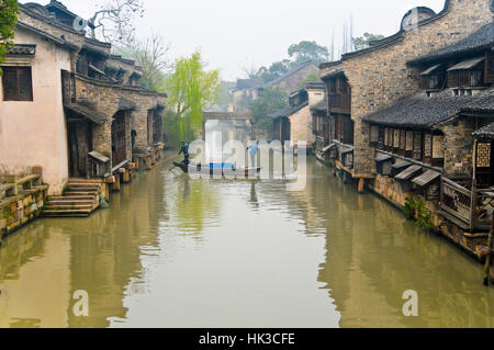 Canal Sweepers in Boat - Wuzhen, China Stock Photo