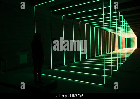 London, UK. 25th Jan, 2017. On Your Wavelenghts isan interactive light sculpture and music installation, part of Winter Lights festival at Canary Wharf, made by Marcus Lyall. It is controlled by a participant's mind via an EEG headset. As their thought patterns change, the electrical data from their brain is used to control the music and create intricate light patterns, which illuminate a large-scale light tunnel fitted with over 30,000 LEDs. Credit: Alberto Pezzali/Pacific Press/Alamy Live News Stock Photo