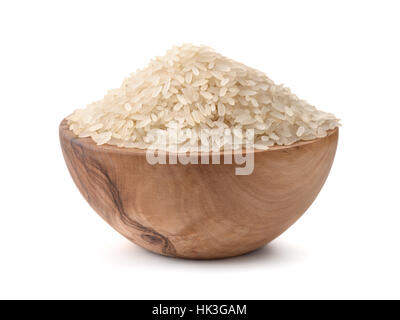 Uncooked dry rice in wooden bowl isolated on white Stock Photo