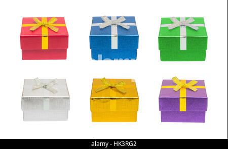 Front view of various shiny colorful blue, red, green, silver, gold, purple christmas gift or present boxes, isolation on white background with clippi Stock Photo