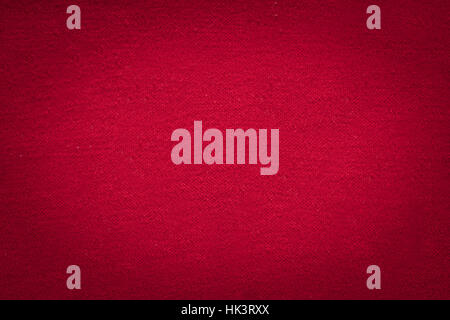 Red cloth texture with black gradient vignette, christmas and valentine concept background with copy space Stock Photo