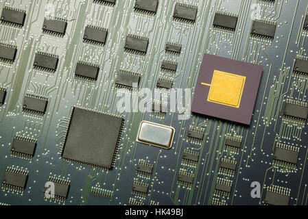 Top view of electronic board with cpu processor and electronic chips technology concept background Stock Photo