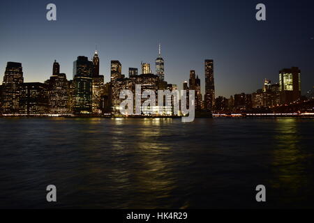 Sunset View of New York City as seen from Brooklyn Bridge Park in Brooklyn, NY