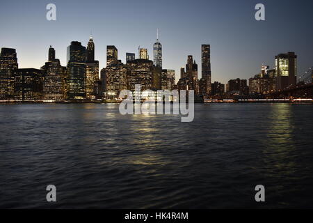 Sunset View of New York City as seen from Brooklyn Bridge Park in Brooklyn, NY