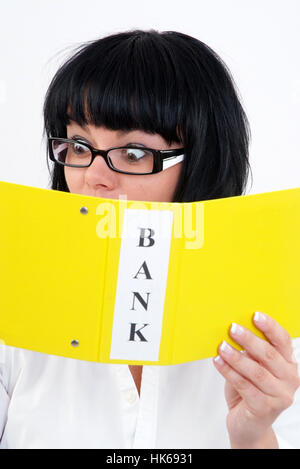 Shocked woman with bank statement Stock Photo