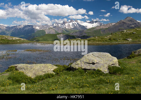 Alpine lake in the French Alps. Col-de-la-Croix-de-Fer, Auvergne-Rhone-Alpes, France Stock Photo