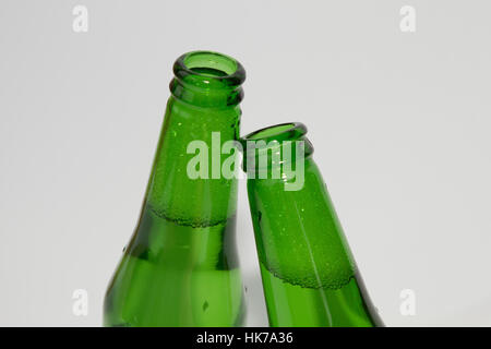 Two green beer bottles on white background Stock Photo