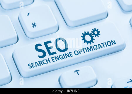 SEO Search Engine Optimization websites internet symbol blue computer keyboard Stock Photo