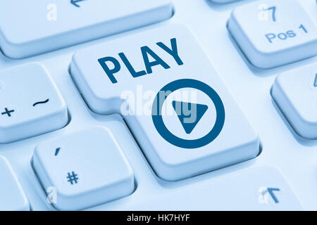 Press Play Button listening music movie internet symbol blue computer keyboard Stock Photo