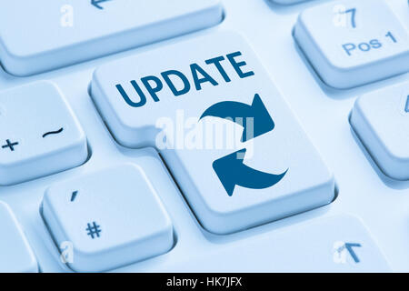 Computer software update network security virus symbol blue keyboard Stock Photo