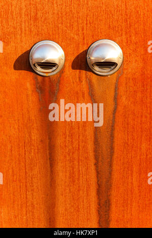 Air outtake on modern architecture building with rusty iron surface. Stock Photo