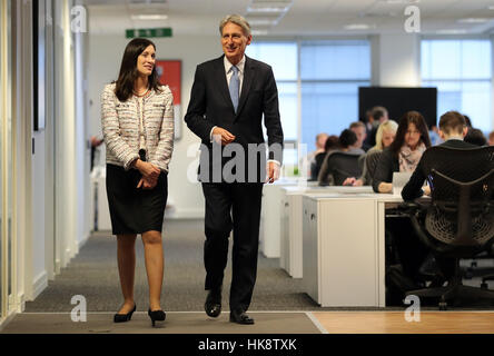 Chancellor Philip Hammond with Microsoft UK CEO Cindy Rose during a visit to the Microsoft Campus, Thames Valley Park, Reading, to coincide with the announcement later of preliminary estimates for 2016Q4 GDP . Stock Photo