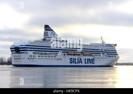 HELSINKI, FINLAND - JAN 25, 2017: Silja Symphony cruise ferry arrives at the icy South Harbour, Helsinki on a winter morning. Stock Photo