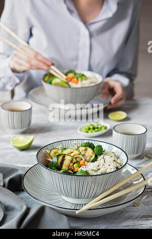 Basmati rice with vegetables on grey background Stock Photo