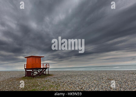 Lifeguard tower on a cloudy day, on the beach along the Black Sea in Batumi, Georgia. Stock Photo