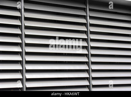 opened metallic   window shutter at the  office building Stock Photo