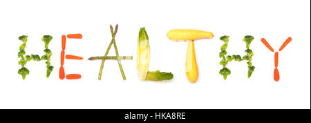 Healthy - word spelled out from vegetables, concept of eating more plant foods; on white Stock Photo