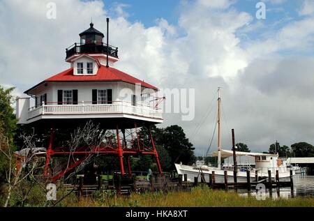 Solomon's Island, Maryland - September 9, 2011: Hexagonal 1883 Drum Point Lighthouse at the open-air Calvert Marine Museum Stock Photo