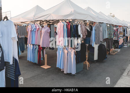business mall concept : many colorful fashion clothes sale in shop at market ,selective focus. Stock Photo