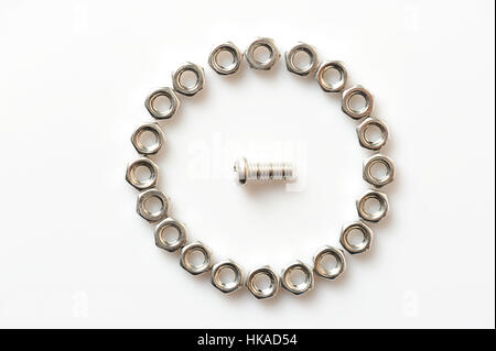 Screw and nuts organized on white background Stock Photo
