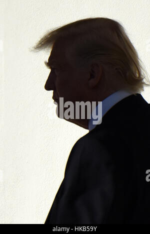 Washington, USA. 26th Jan, 2017. U.S. President Donald Trump walks to the Oval Office after returning to the White House in Washington, DC, the United States. U.S. President Donald Trump wants a 20-percent border tax on all imports from Mexico, said White House spokesman Sean Spicer on Thursday. Credit: Yin Bogu/Xinhua/Alamy Live News