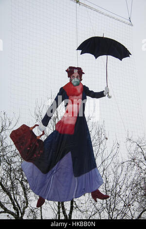 London, UK. 27th Jan, 2017. Mary Poppins flies in an air balloon at Somerset House as part of Tension in the air protest by Greenpeace following a week of high alert pollution Credit: amer ghazzal/Alamy Live News Stock Photo