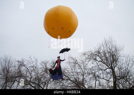 London, UK. 27th Jan, 2017. Mary Poppins flies in an air balloon at Somerset House as part of Tension in the air protest by Greenpeace following a week of high alert pollution Credit: amer ghazzal/Alamy Live News Stock Photo