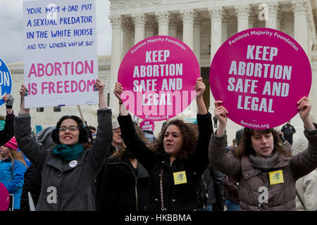 Washington, DC, USA. 27th January, 2017.Thousands of pro-life activists march from the National Mall to the Supreme Court building for the annual Pro-Life March.  Many pro-choice activists also gather in front of the Supreme Court, where both sides protest side by side. Credit: B Christopher/Alamy Live News