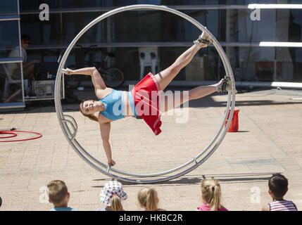 Christchurch, New Zealand. 28th Jan, 2017. Australian street performer Hannah Cryle performs her Big Wheel Show at the World Buskers Festival. Buskers from around the world performed at the event, which ran Jan. 19-29. Credit: PJ Heller/ZUMA Wire/Alamy Live News Stock Photo