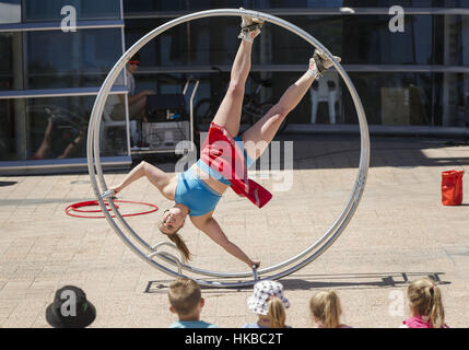 Christchurch, New Zealand. 28th Jan, 2017. Australian street performer Hannah Cryle performs her Big Wheel Show at the World Buskers Festival. Buskers from around the world performed at the event, which ran Jan. 19-29. Credit: PJ Heller/ZUMA Wire/Alamy Live News Stock Photo