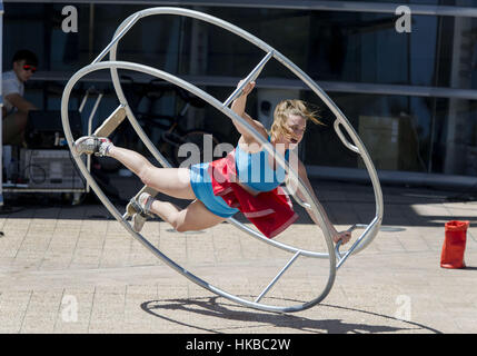 Christchurch, New Zealand. 28th Jan, 2017. Street performer Hannah Cryle of Melbourne, Australia, performs her Big Wheel Show at the World Buskers Festival. Buskers from around the world performed at the event, which ran Jan. 19-29. Credit: PJ Heller/ZUMA Wire/Alamy Live News Stock Photo