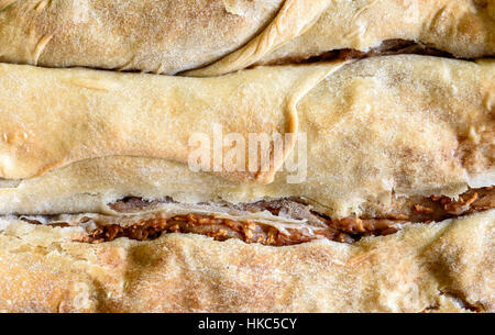 Ready made Homemade Apple Strudel, Pie, Burek or other kind of pastry appetizer or sweets on a backing tray. Stock Photo