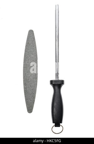Grindstone or whetstone and sharpener on white background. Kitchen utensils Stock Photo