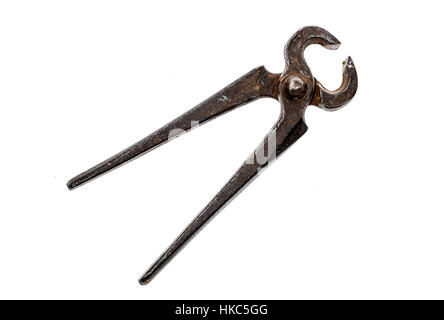 Old iron cutting pliers, tongs or nippers isolated on white. Studio photo shot of rusty work tools. Stock Photo