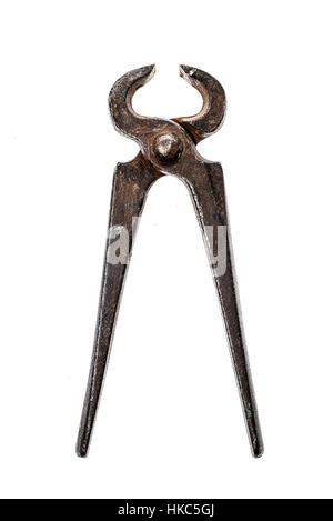 Old iron cutting pliers, tongs or nippers isolated on white. Studio photo shot of rusty work tools. Stock Photo