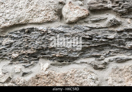 Natural gray pavement stone texture for floor, wall or path. Traditional fence, court, backyard or road paving. Stock Photo
