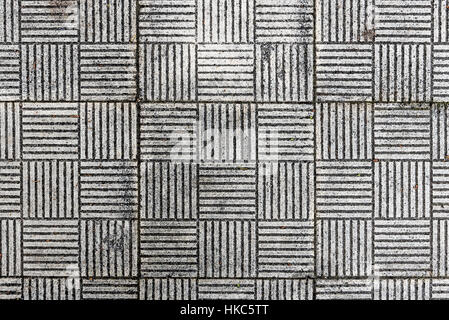 Natural gray pavement stone texture for floor, wall or path. Traditional fence, court, backyard or road paving. Stock Photo