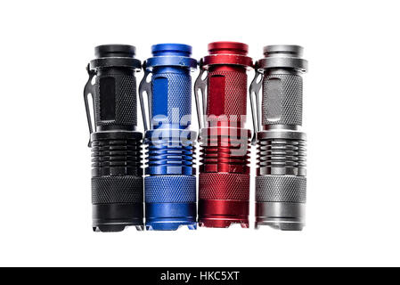 Aluminium metal LED flashlight torch isolated on white background. Different color small aluminum hand flashlight. Stock Photo