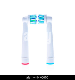 Electric Toothbrush replacement heads with color rings, isolated on white background. Stock Photo