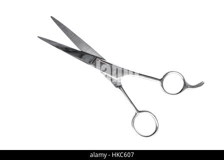 Hairdresser or barber silver professional scissors for cutting hair. Isolated on white background Stock Photo