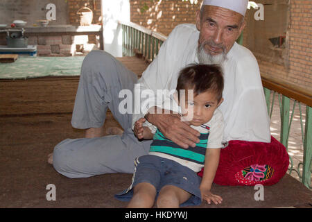 Uyghur family. Xinjiang Autonomous Region, China. Stock Photo