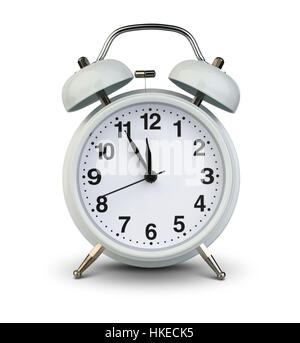 Alarm clock isolated on white with clipping path, five minutes to twelve Stock Photo